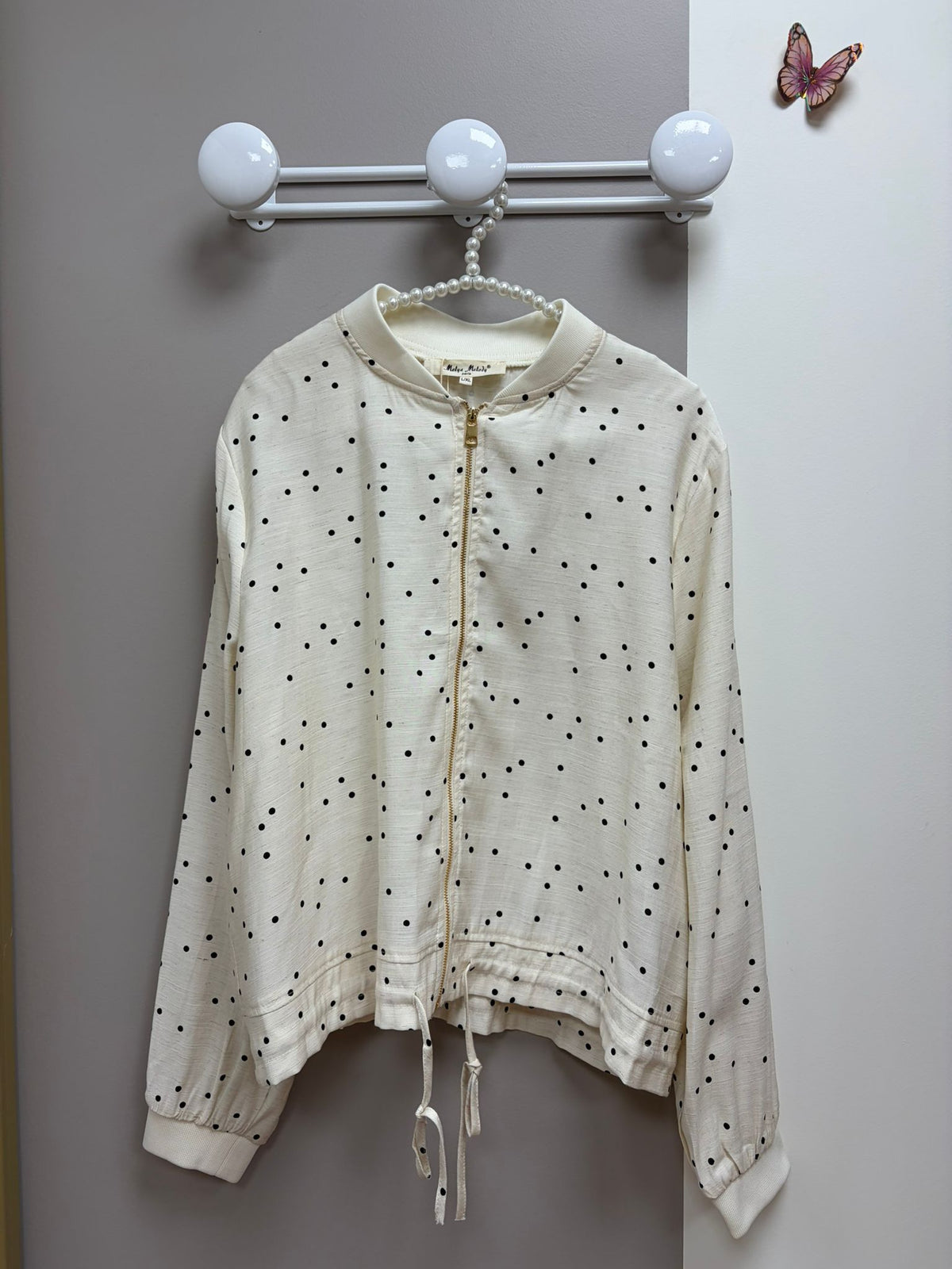 Veste beige à pois